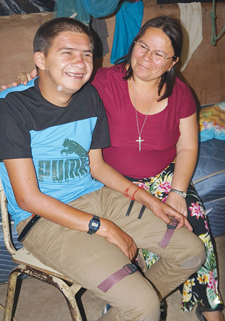 Juan Carlos Pineda enjoys a visit with Sister Vilma Franco, S.P..