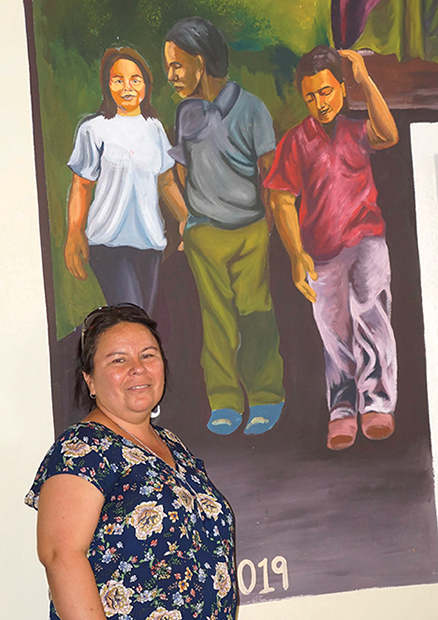 A church mural recalling those affected by atrocities during the Salvadoran civil war depicts Sister Vilma Franco, S.P. as a child. 