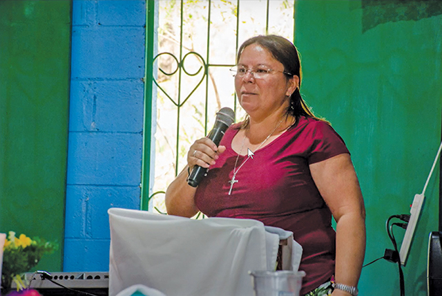 Sister Vilma Franco, S.P.leads a church service. 