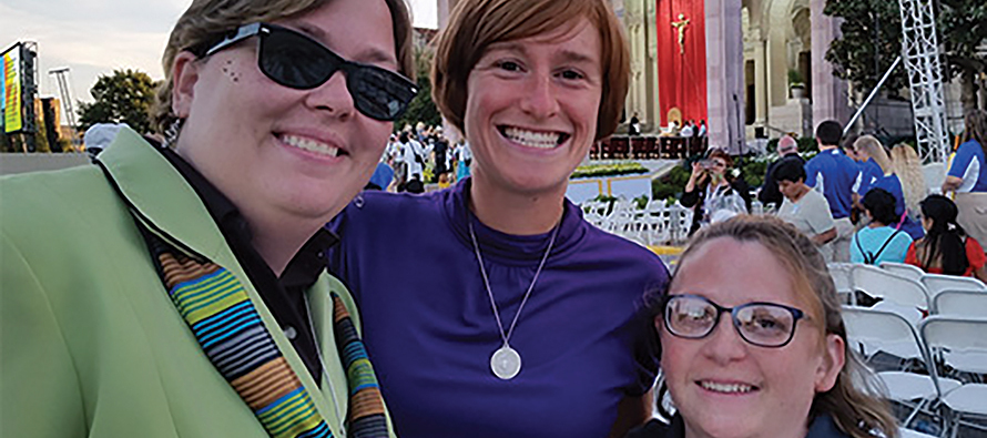 Sister Shannon Fox, S.S.J.-T.O.S.F. is joined by Sister Kimberly Mulhearn, S.S.J.-T.O.S.F. and a fellow sister from Giving Voice during Pope Francis