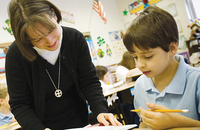 Sister Lindena Brace, S.C., a Sister of Charity of Seton Hill, teaches a child