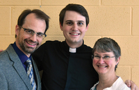 Kevin and Kit Cummings, the parents of Father Evan Cummings, C.S.P., with their son